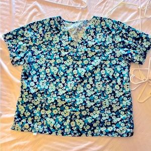 Butter, soft cotton scrub top. Super comfy.